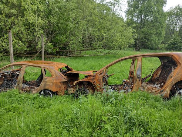 Burnt out cars at Cadder Woods before our works started